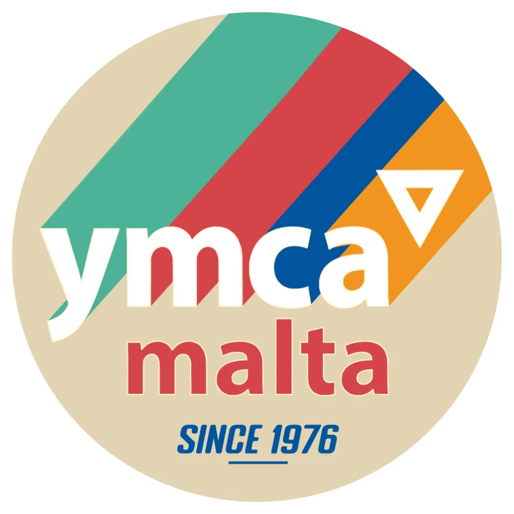 Official logo of YMCA Malta, promoting social justice and community support since 1976. This image represents the official logo of YMCA Malta, an organization dedicated to building a more just society by empowering young people and supporting vulnerable community members.