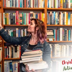 CHRISTMAS TIME Book Sale assistants during a YMCA fundraising activity