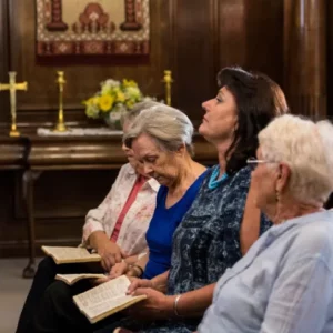 Assist and accompany elderly residents attending Sunday Mass